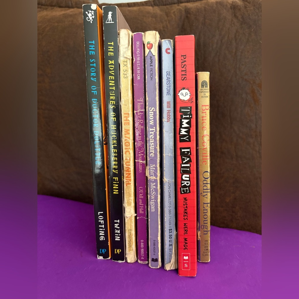 8 new and used paperback books for the tween reader. Very good books.